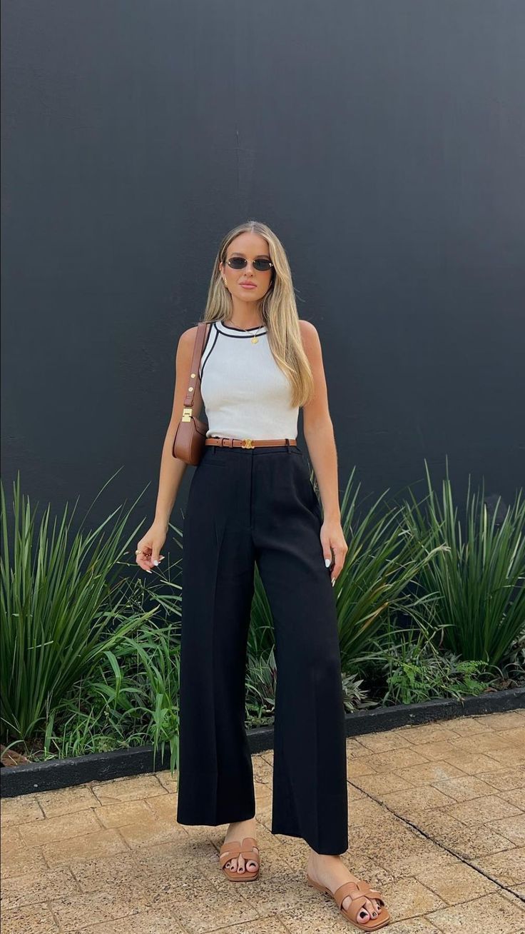 White sleeveless top with black Aritzia Effortless Pant